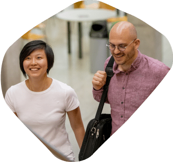 Two coworkers walking together